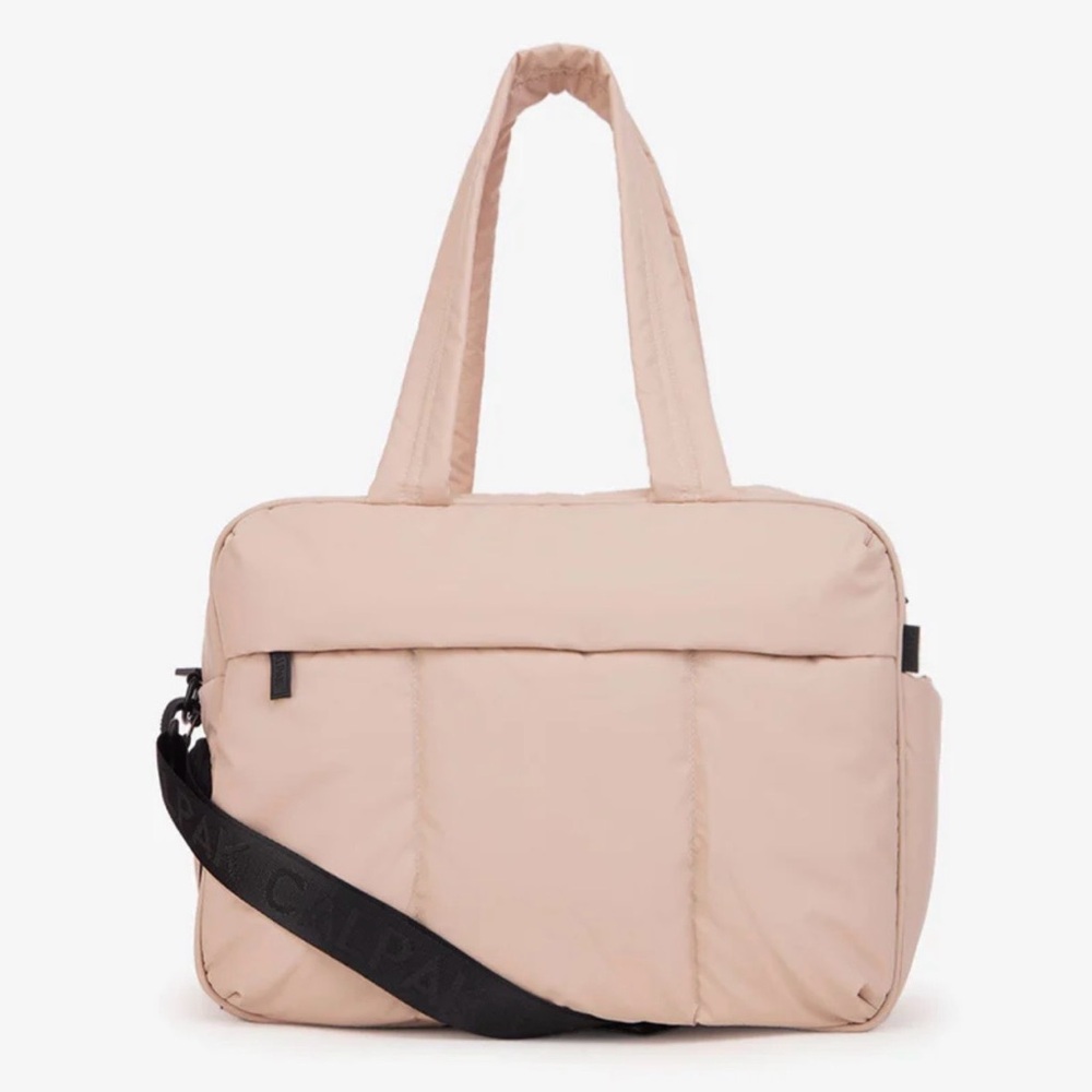 CALPAK Luka Duffel in Rose Quartz.